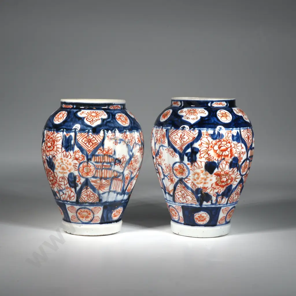 Pair Of Japanese Imari VasesWith Ribbed  Body & Iron Red Overall Intricate Floral Decoration Image 1++