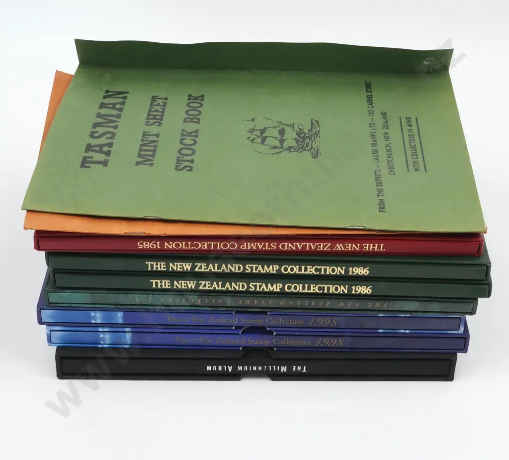Seven New Zealand Stamp Collection Stamp Albums - including 2 x 1998, 2 x 1986, 1982, 1985  & The Millenium Album  Image 1++