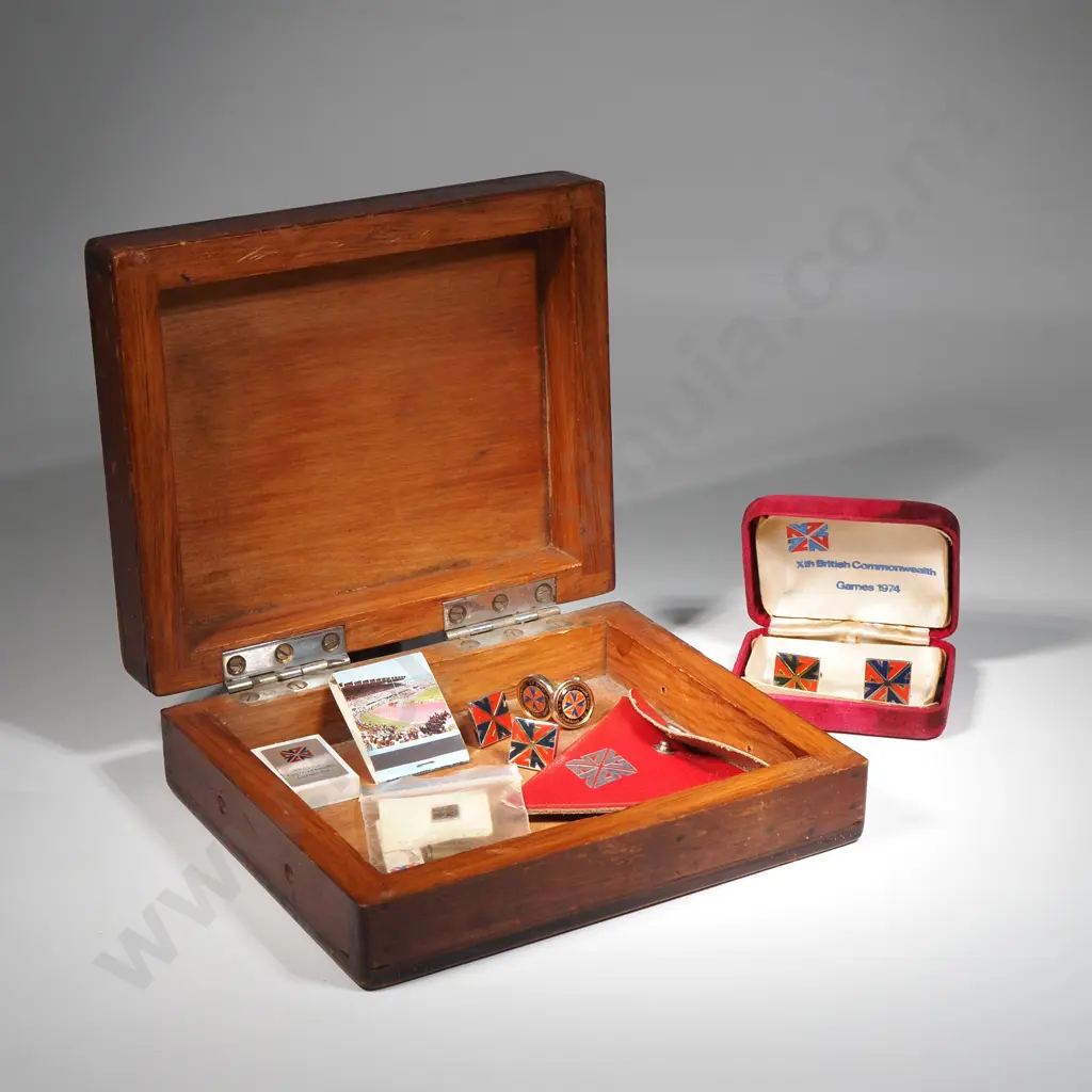 Vintage Wooden Box Containing Three Commonwealth Games Cufflinks, Frostee Games Bottle Top, Flint Lighter (a/f)  Image 1++