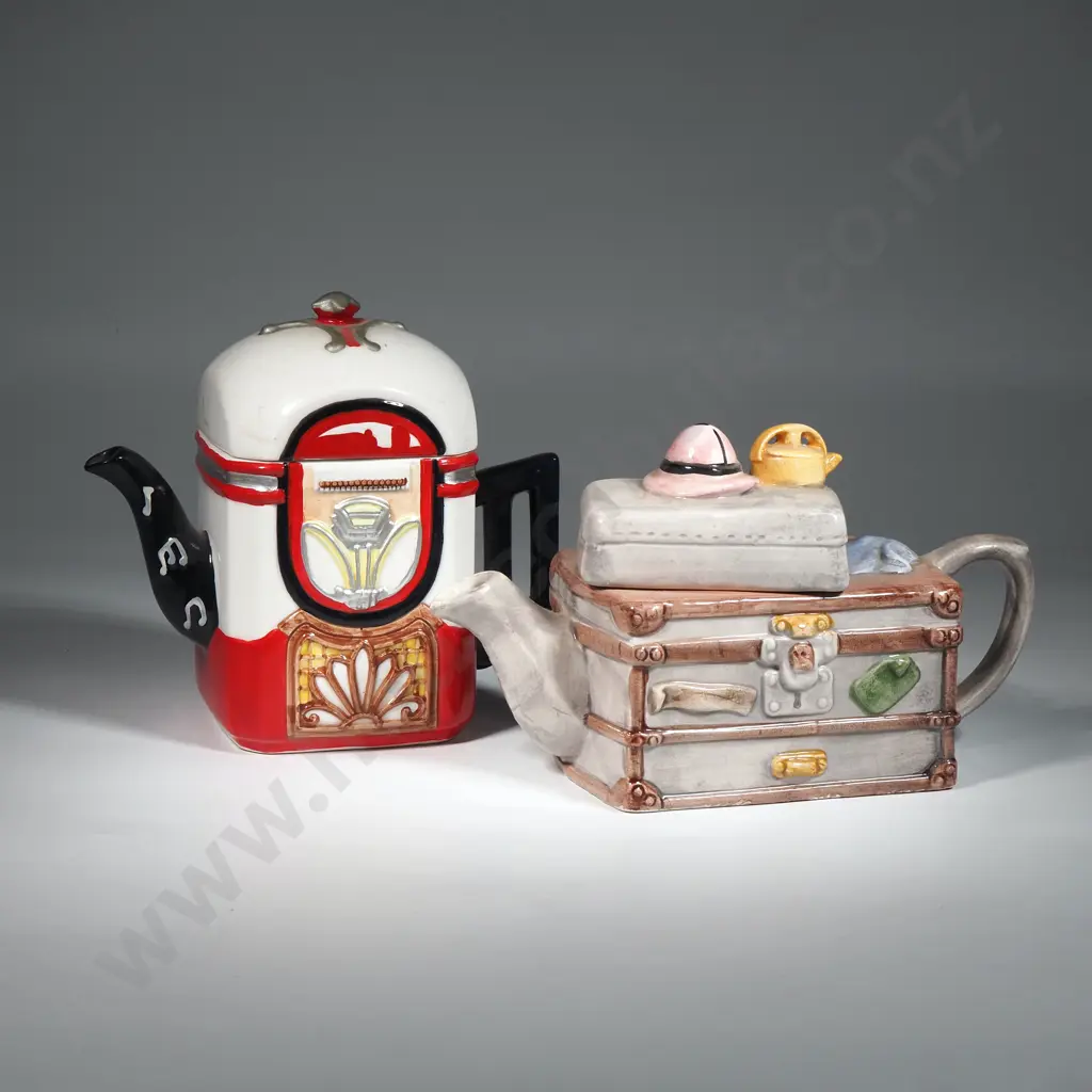 A Pair of Large Novelty Teapots Image 1++
