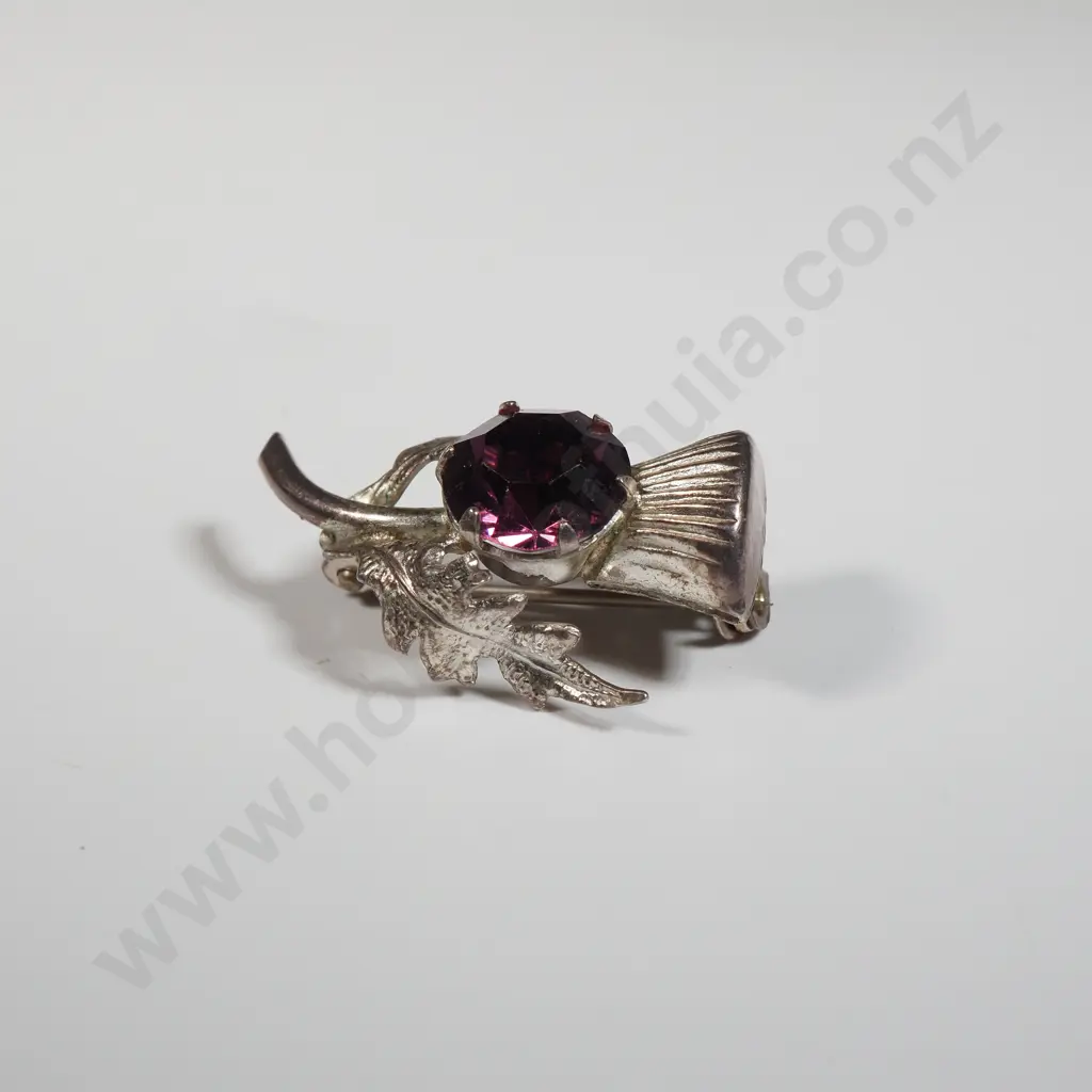 Small Sterling Silver Thistle Brooch Inset With A Purple Stone Image 1++