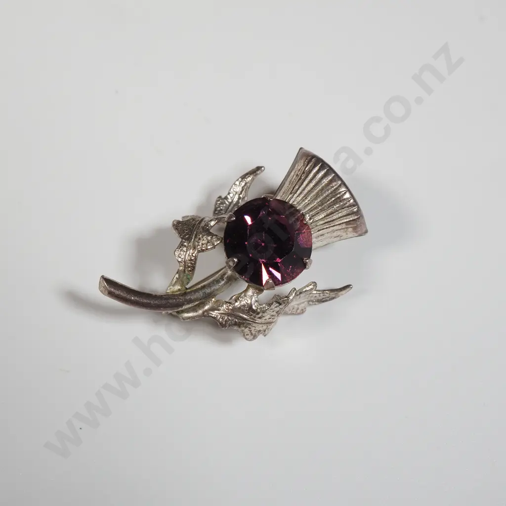 Small Sterling Silver Thistle Brooch Inset With A Purple Stone Image 1++