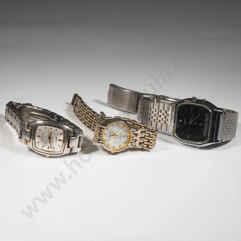Three Watches Including A  Ladies Rolex Copy Watch, A Lorus Ladies Watch & Mens Casio Digital Watch Image 1++