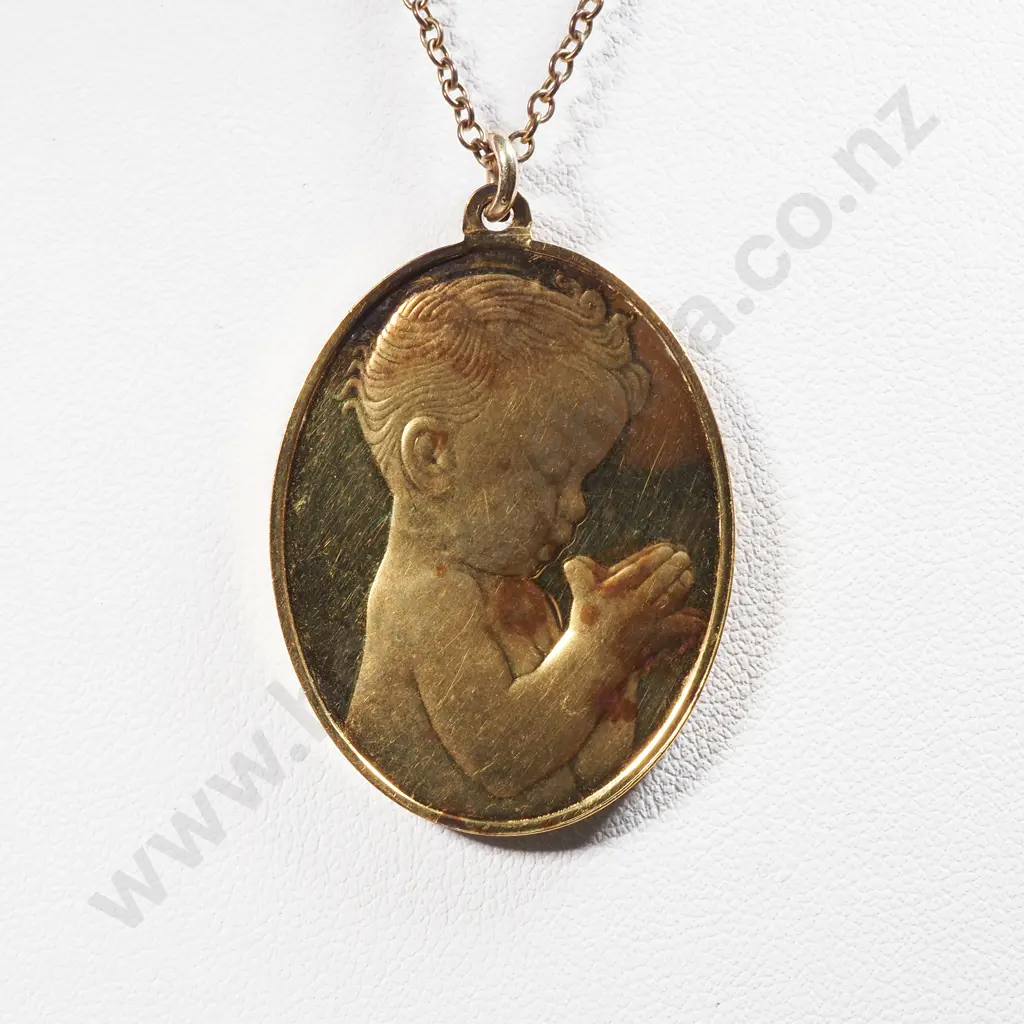 Gold Plated Sterling Silver Oval Pendant With Embossed Detail Of A Praying Child Image 1++