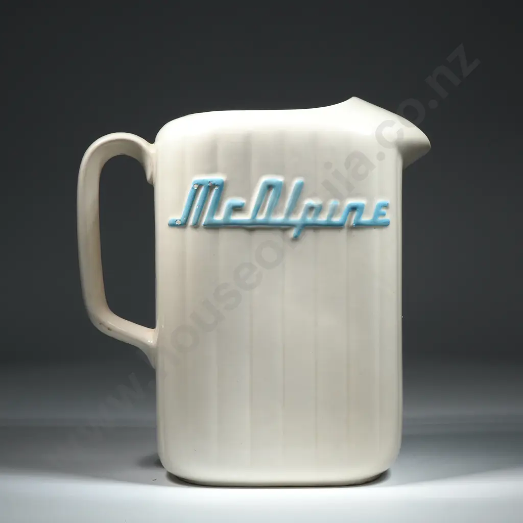 A Crown Lynn White McAlpine Refrigerator Jug. Ribbed rectangular section form with 'McAlpine' w Blue Highlighted Letters Image 1++