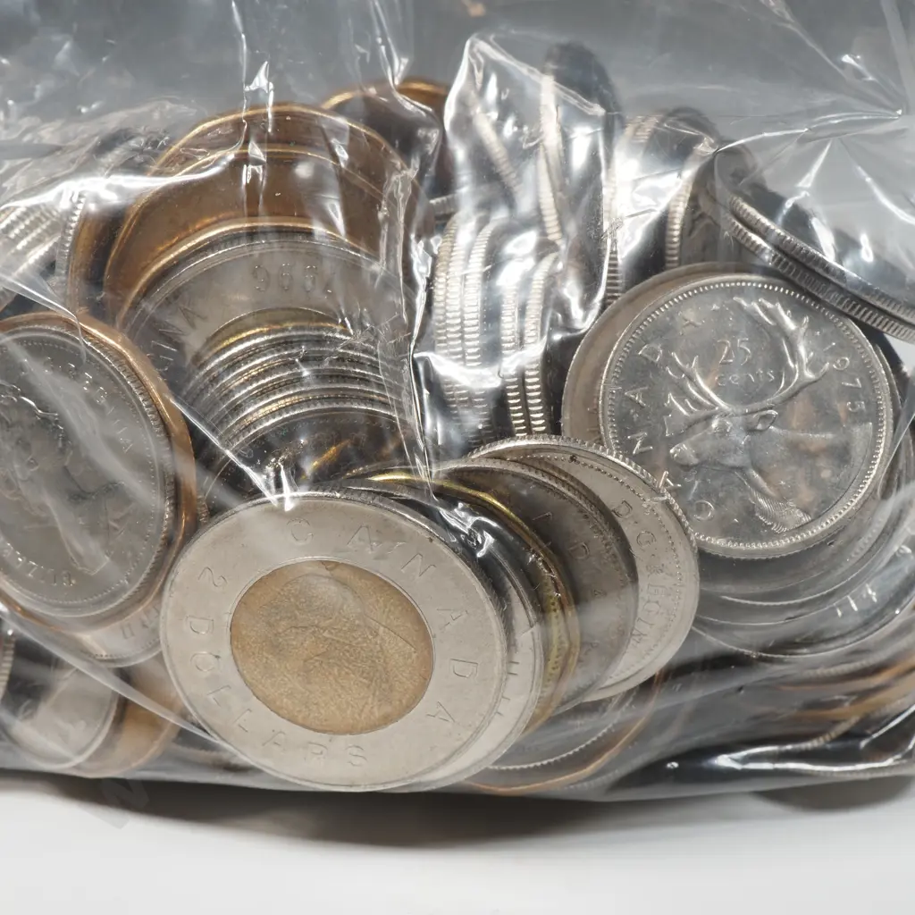Current coins, $87 Canadian in 10, 25, 50 cents and $1 and $2 – approximate exchange rate NZD $107 Image 1++