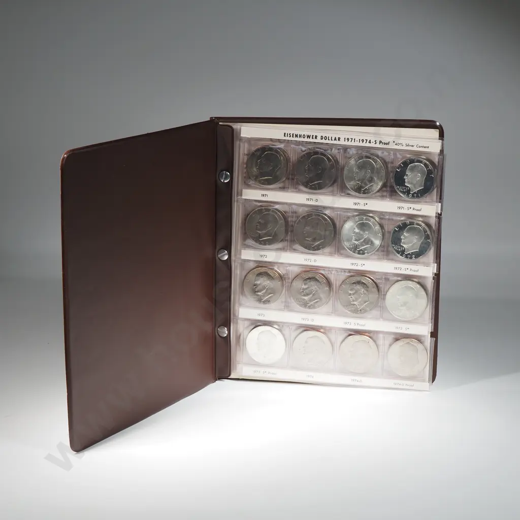 31 x USA Eisenhower large one dollar coins in album including silver and proof issues Image 1++
