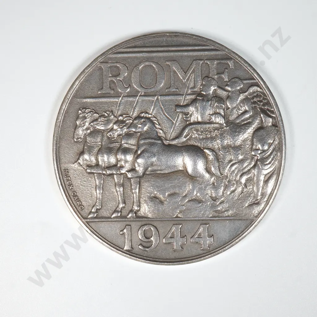 Sterling silver prize medal struck for 2nd New Zealand Expeditionary Force. Engraved “1946 / DISCUS THROW / JAPAN / 122 FEET 8 INCHES / W. I. GARDINER”. 47mm, 50.3 grams. It is listed in the Catalogue of New Zealand Commemorative Medals 1941-2007 by Hamish MacMaster as number 1944/1 and is very rare Image 1++