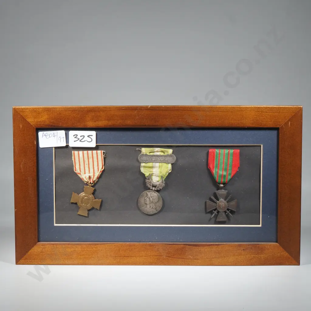 Three French Medals in Wooden Frame Image 1++