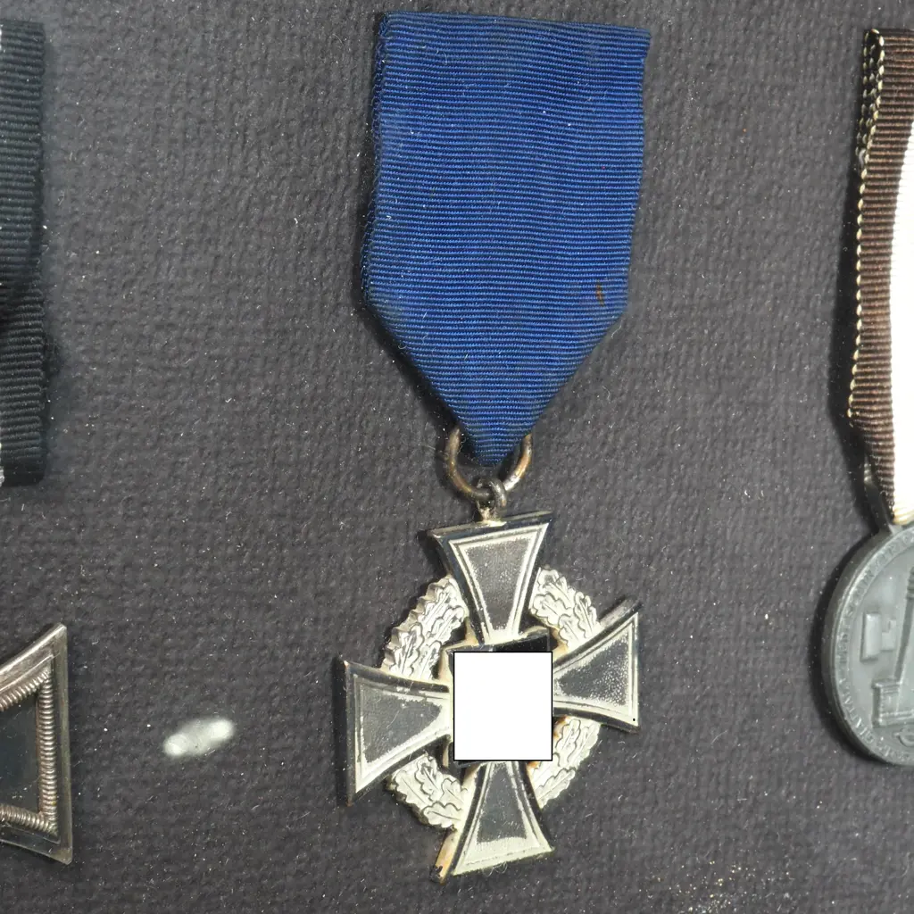 Four WW2 German Medals in Wooden Frame Image 1++
