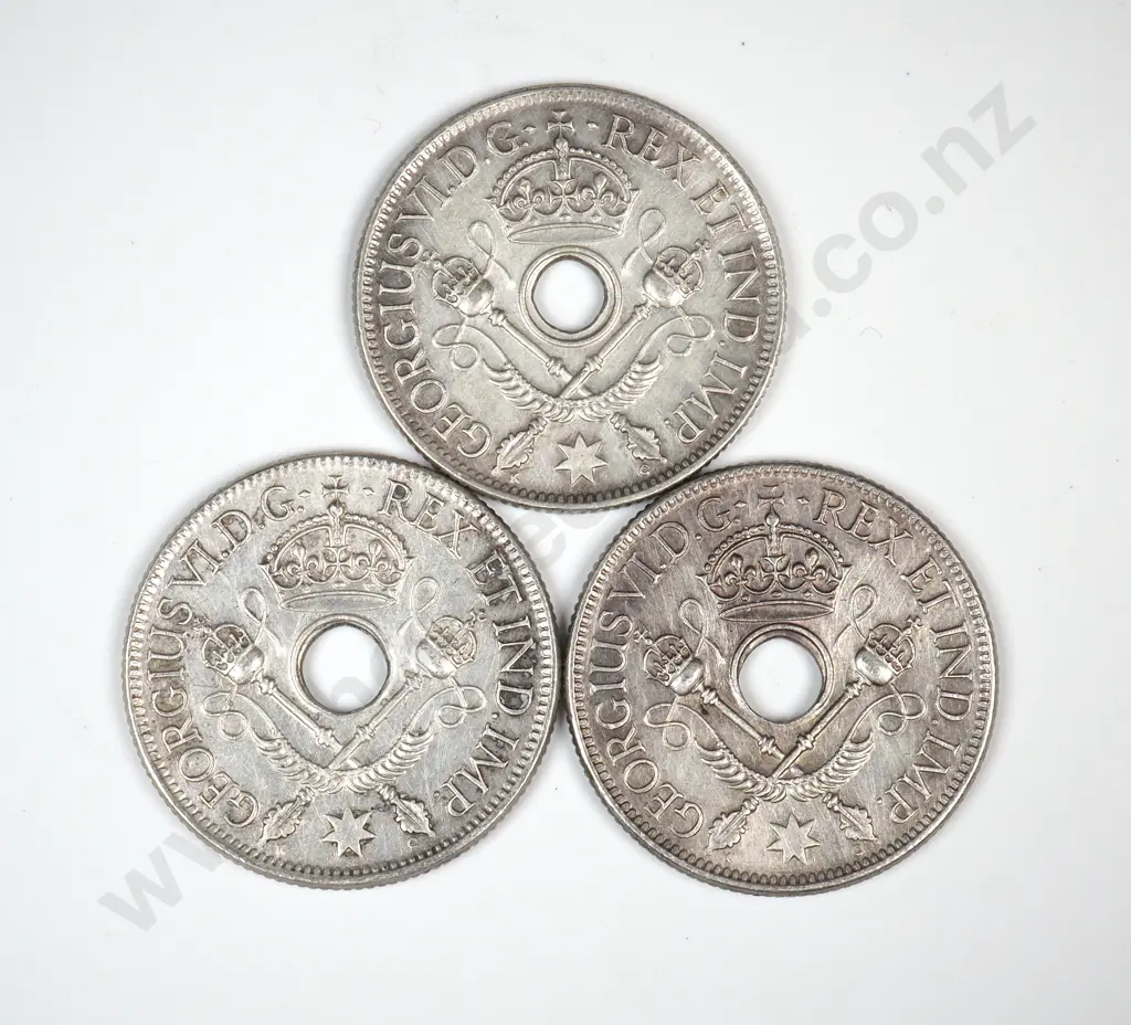 Three 1938 Territory of New Guinea One Shilling Coins  - Better Grades  Image 1++