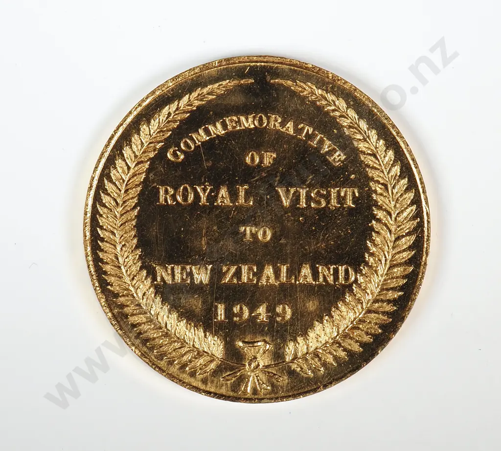 Gilt medal struck  to commemorate the proposed Royal visit of King George VI and Queen Elizabeth in 1949. 35mm. It is listed in the Catalogue of New Zealand Commemorative Medals 1941-2007 by Hamish MacMaster as number 1949/3 and is very rare Image 1++