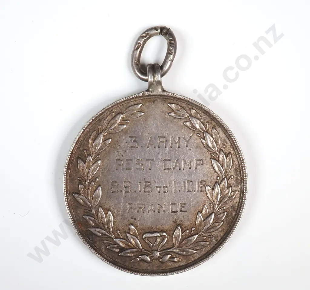 Antique sterling silver medal engraved “3. ARMY / REST CAMP / 18.9.18 TO 1.10.18 / FRANCE” and “CRICKET / RFN. G McANULTY / N.Z.R.B.”. 31mm Image 1++