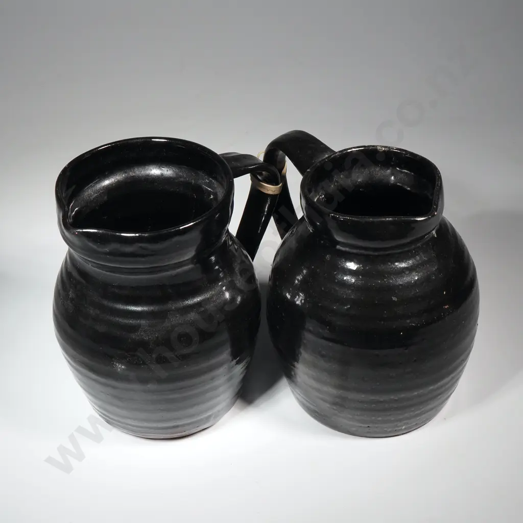 Pair of  Black Ribbed Pottery Jugs  Image 1++
