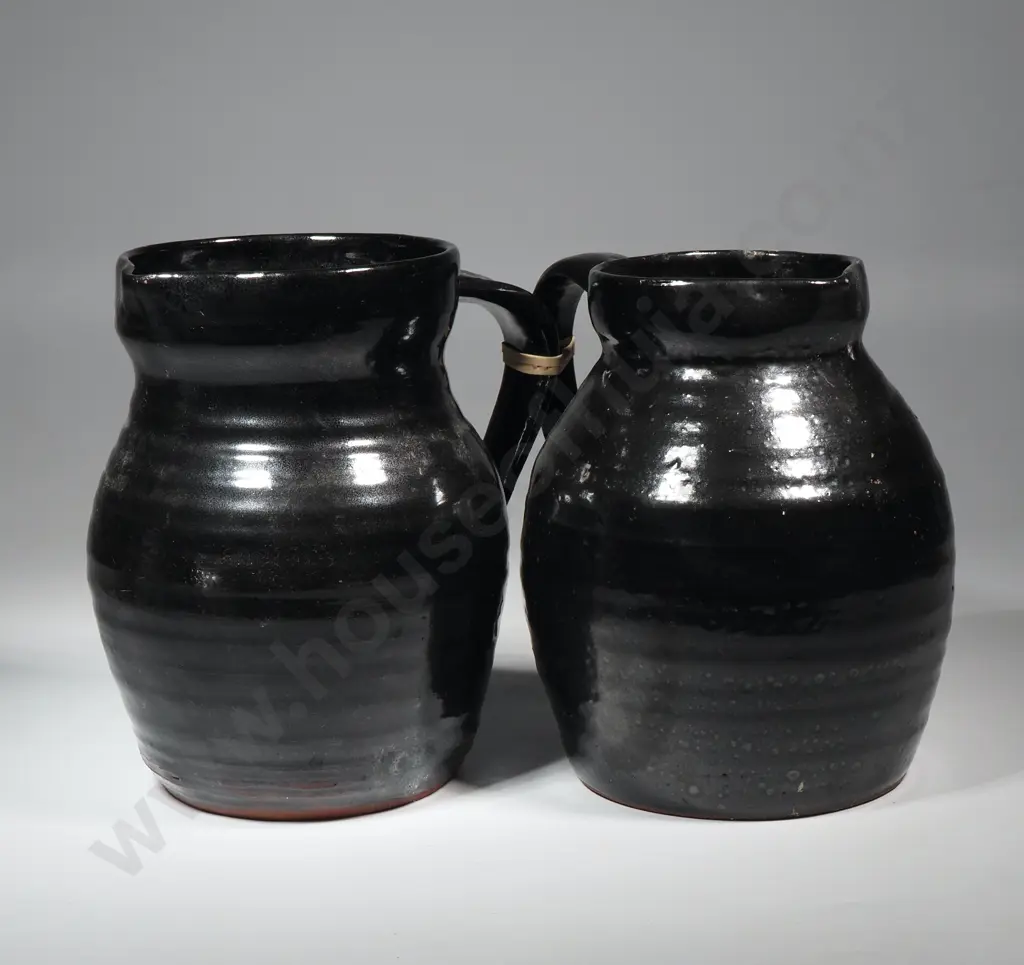 Pair of  Black Ribbed Pottery Jugs  Image 1++