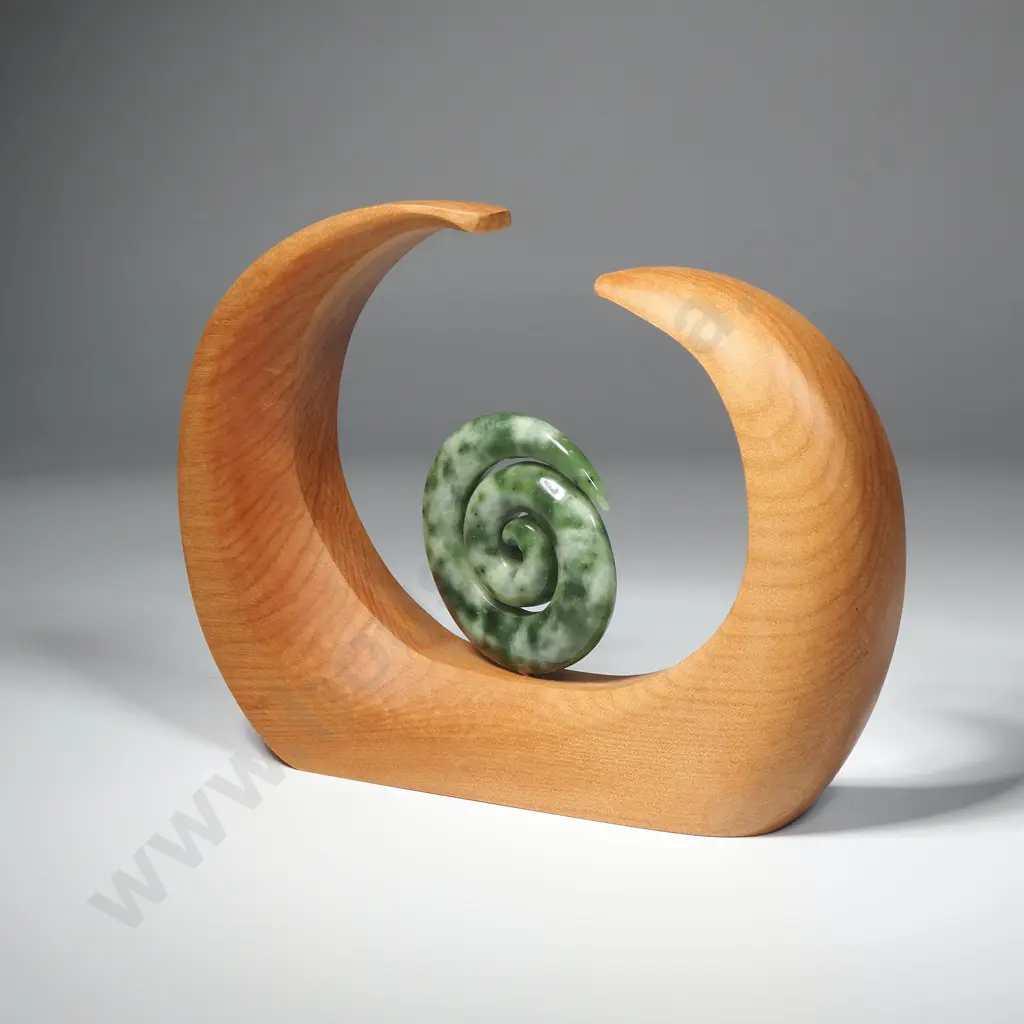 Hand Carved Pounamu/Flower Jade Koru Sculpture Resting in a Kauri Stand Image 1++