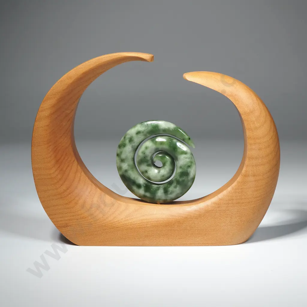 Hand Carved Pounamu/Flower Jade Koru Sculpture Resting in a Kauri Stand Image 1++