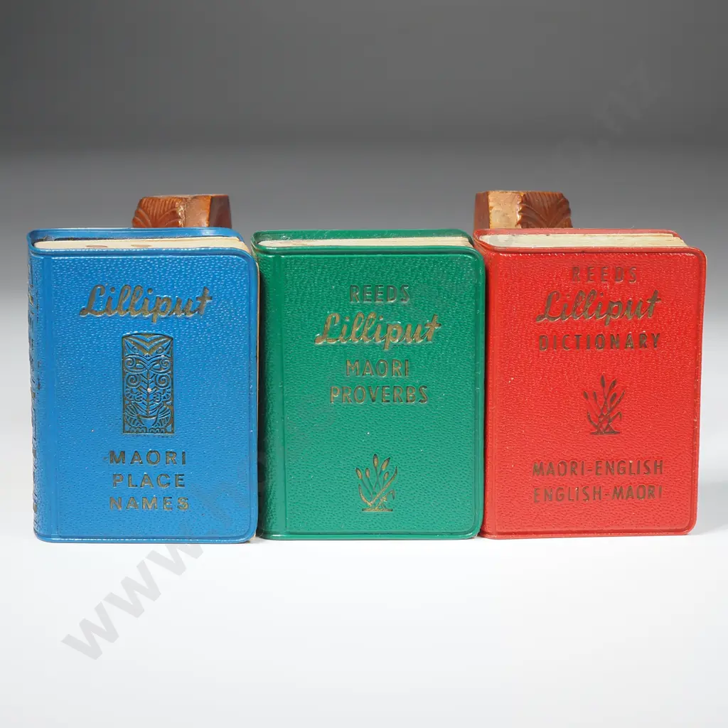 Three Lilliput Books (Maori Place Names/Proverbs/NZ Maori Dictionary) in NZ Timber Marquetry Bookstand. Image 1++