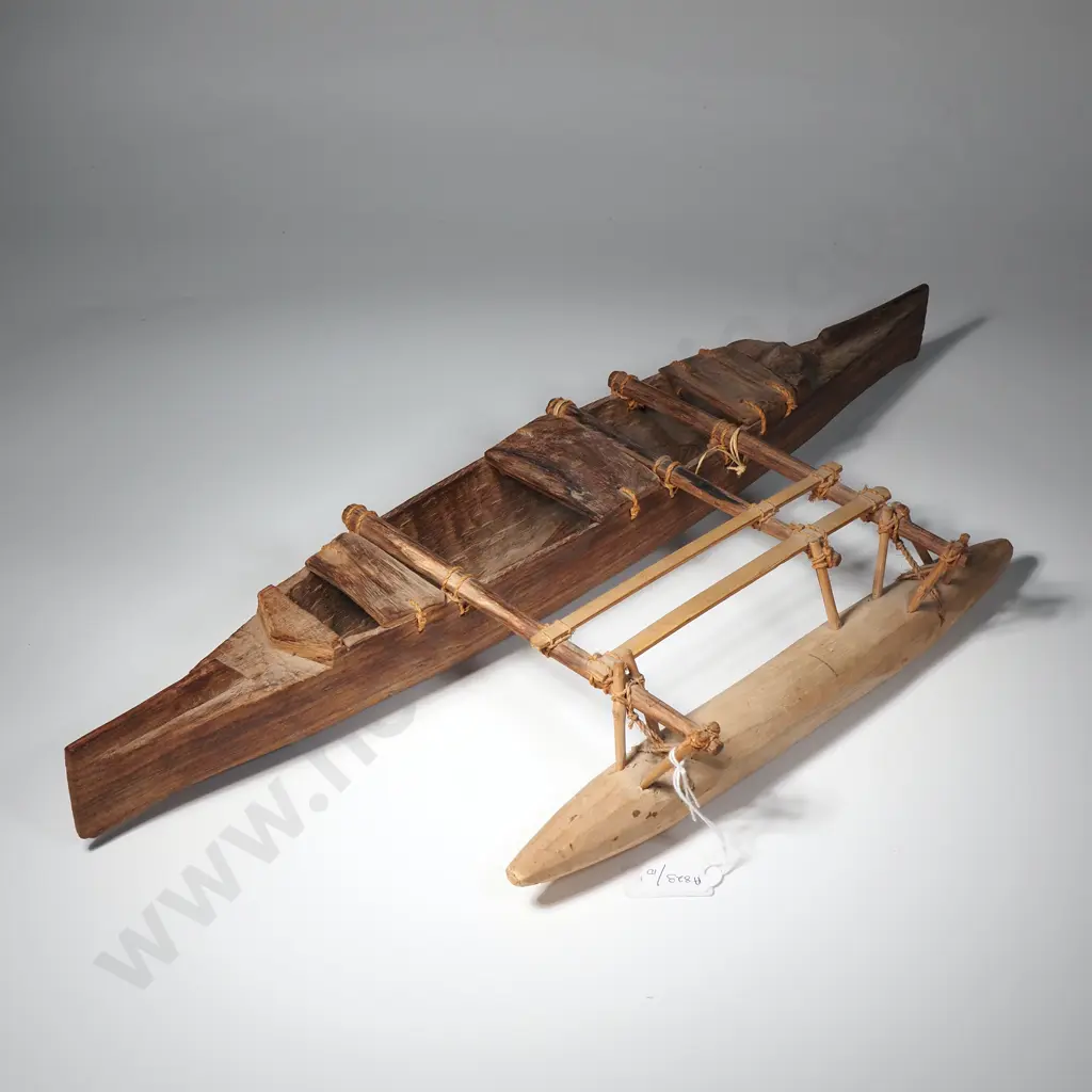 Model of Outrigger Canoe w Paddles Image 1++