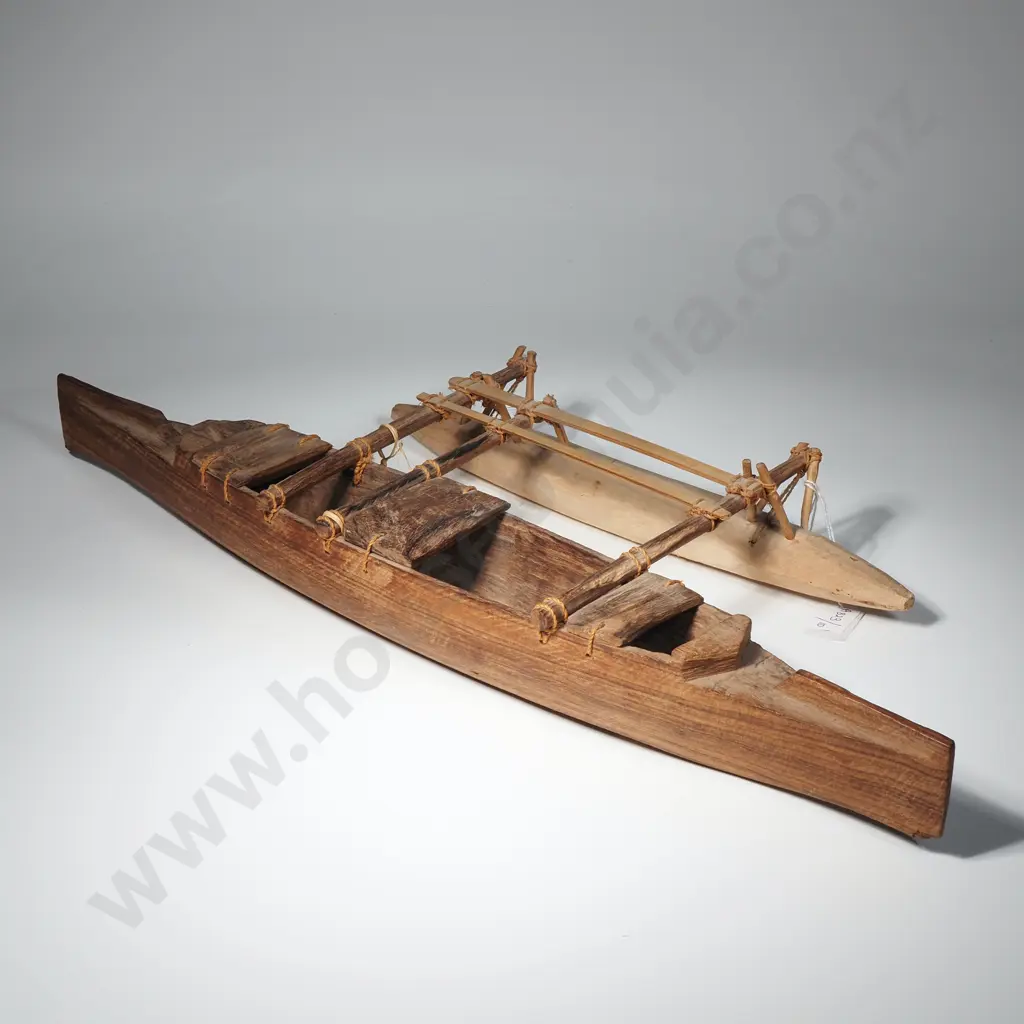 Model of Outrigger Canoe w Paddles Image 1++