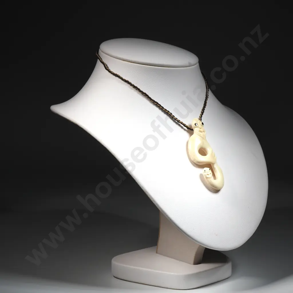 Carved Bone Taniwha Pendant on Plaited Cord Image 1++