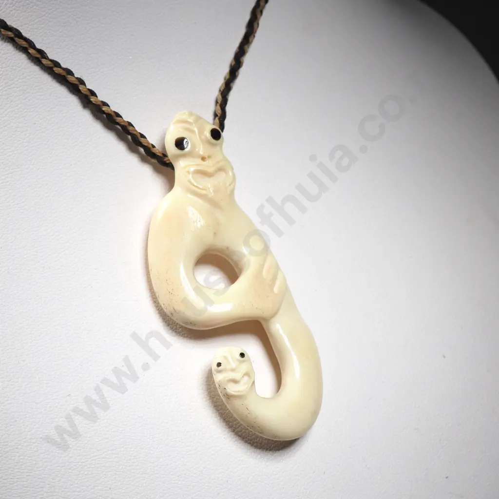 Carved Bone Taniwha Pendant on Plaited Cord Image 1++