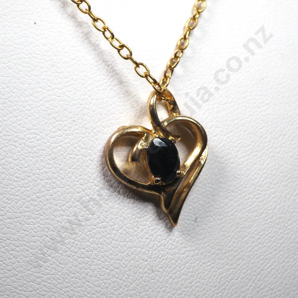 Blue Stone in Gold Toned Pendant & Chain. Image 1++