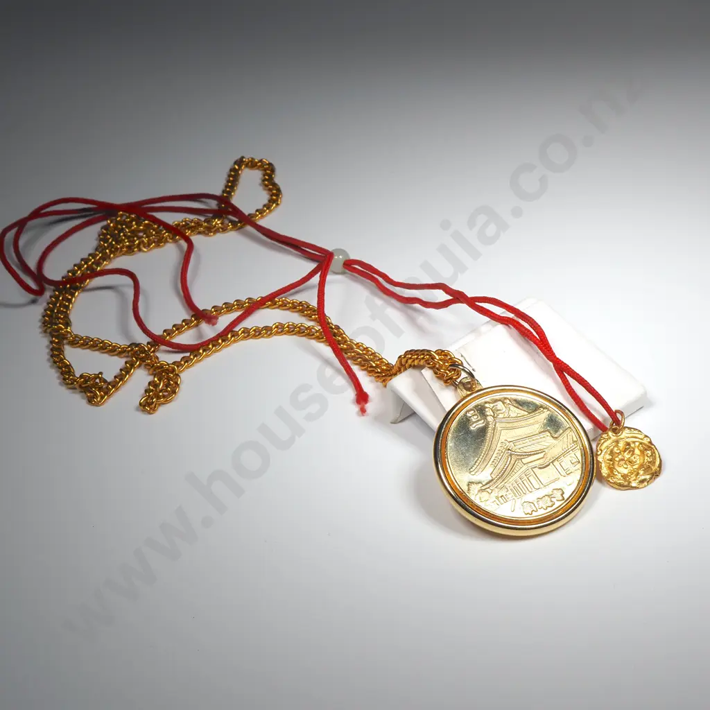 Two Gold Toned Pendants - One w Chain & One w Red Rope & Jade Coloured Bead. Image 1++