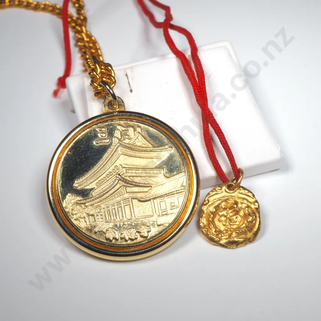 Two Gold Toned Pendants - One w Chain & One w Red Rope & Jade Coloured Bead. Image 1++