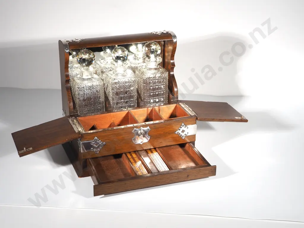 Highly Decorative Victorian Tantalus Three Decanter Set Image 1++