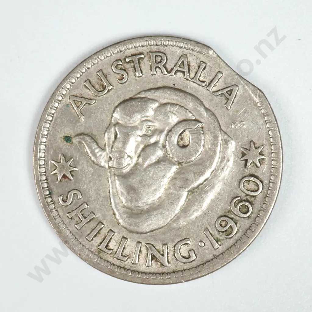 1960 Australian Shilling - Clipped Planchet  Image 1++