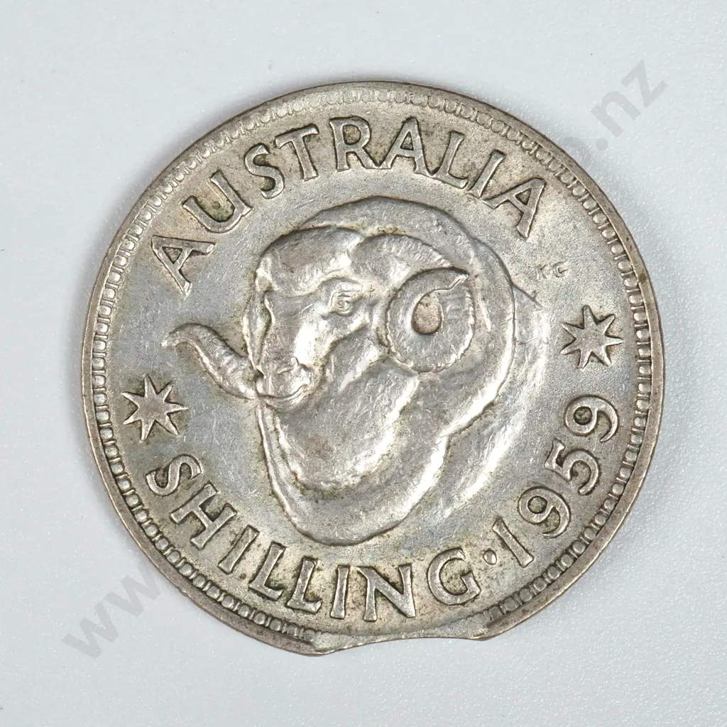 1959 Australian Shilling - Clipped Planchet  Image 1++