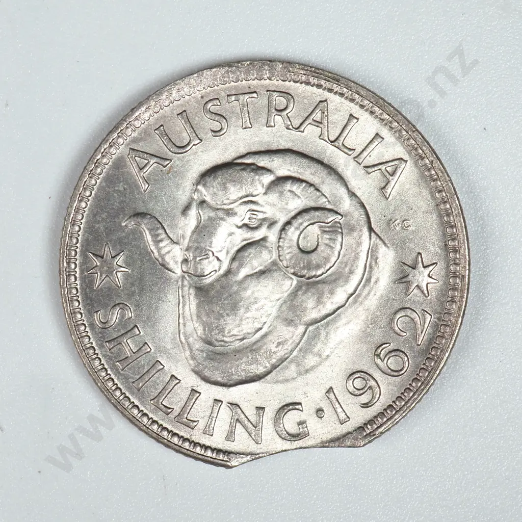 1962 Australian Shilling - Clipped Planchet  Image 1++