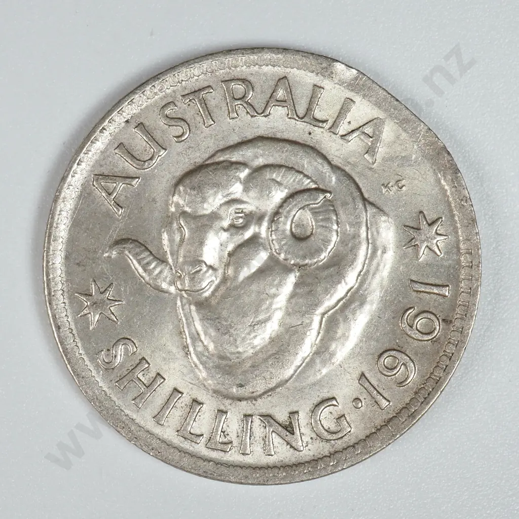 1961 Australian Shilling Clipped Planchet  Image 1++