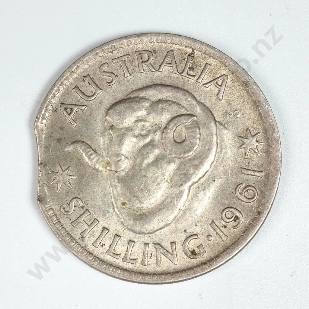 1961 Australian Shilling - Clipped Planchet  Image 1++