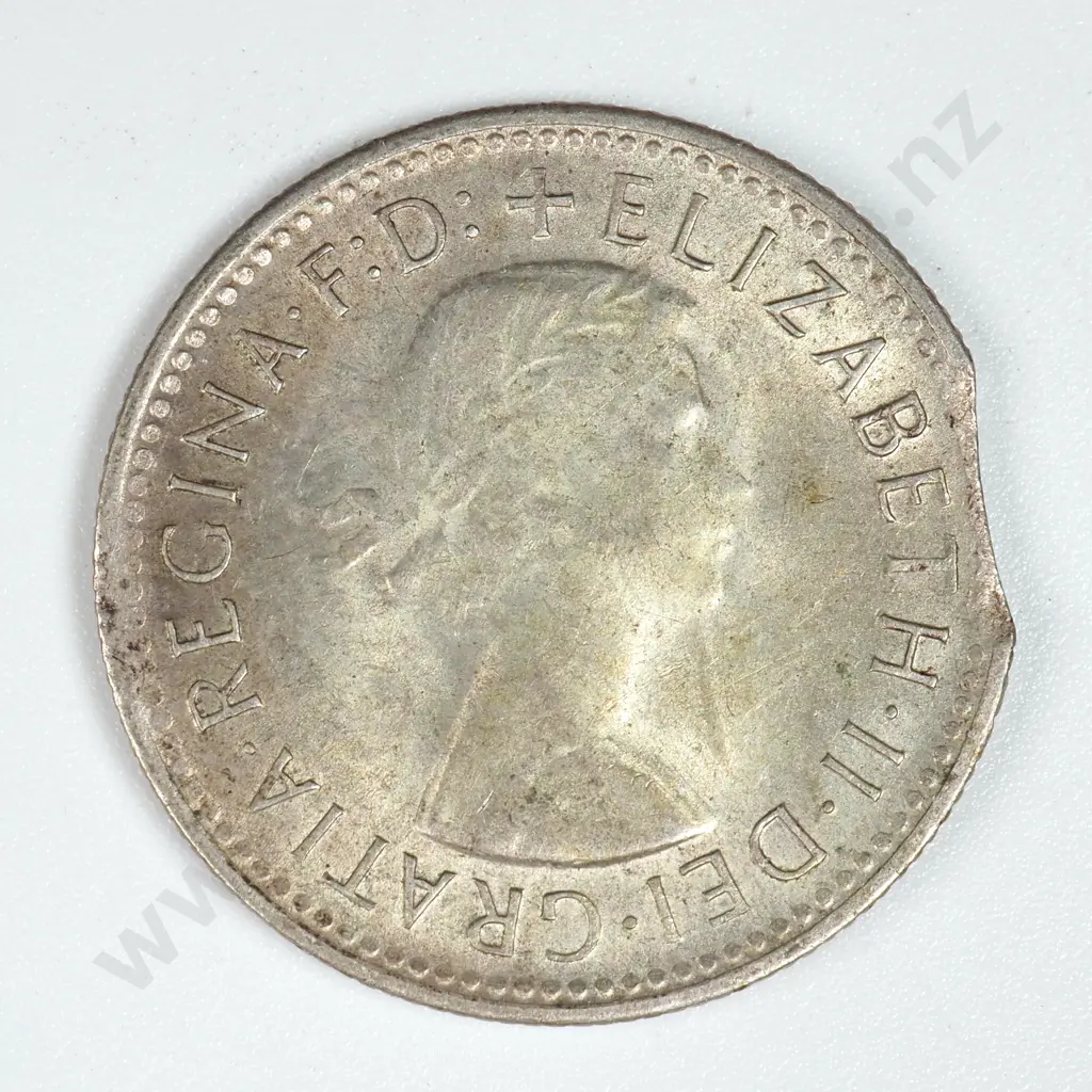 1961 Australian Shilling - Clipped Planchet  Image 1++