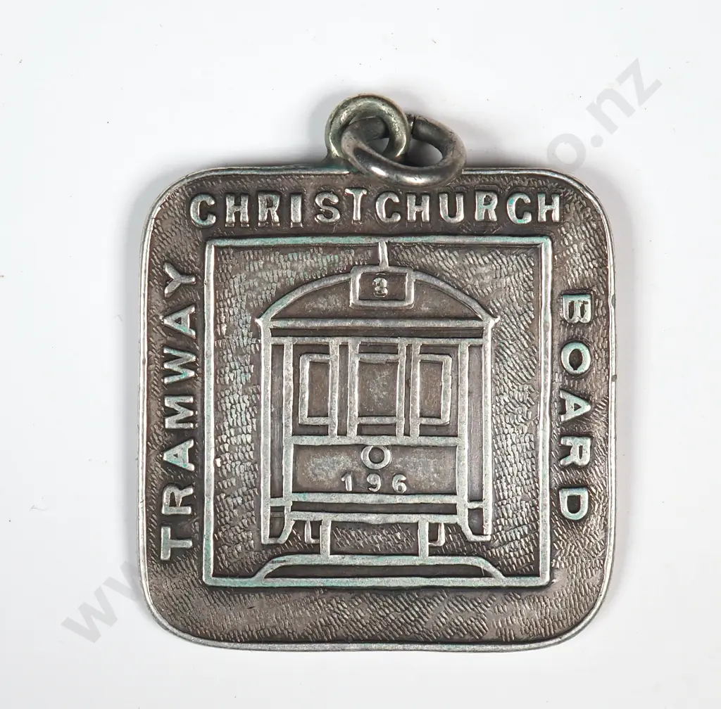 Antique sterling silver Christchurch Tramway Board Pass, number 28, by Moller & Young, Christchurch, 27mm by 27mm, in packet from Heritage International Ltd with a price of $795 Image 1++