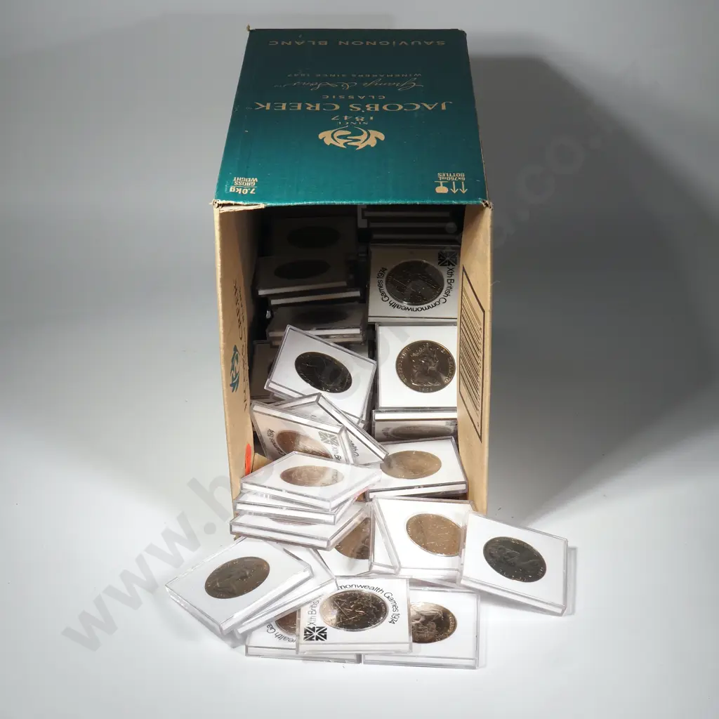 70 X 1974 GAMES CASED $1 COINS – CASES MOSTLY SCRATCHED Image 1++