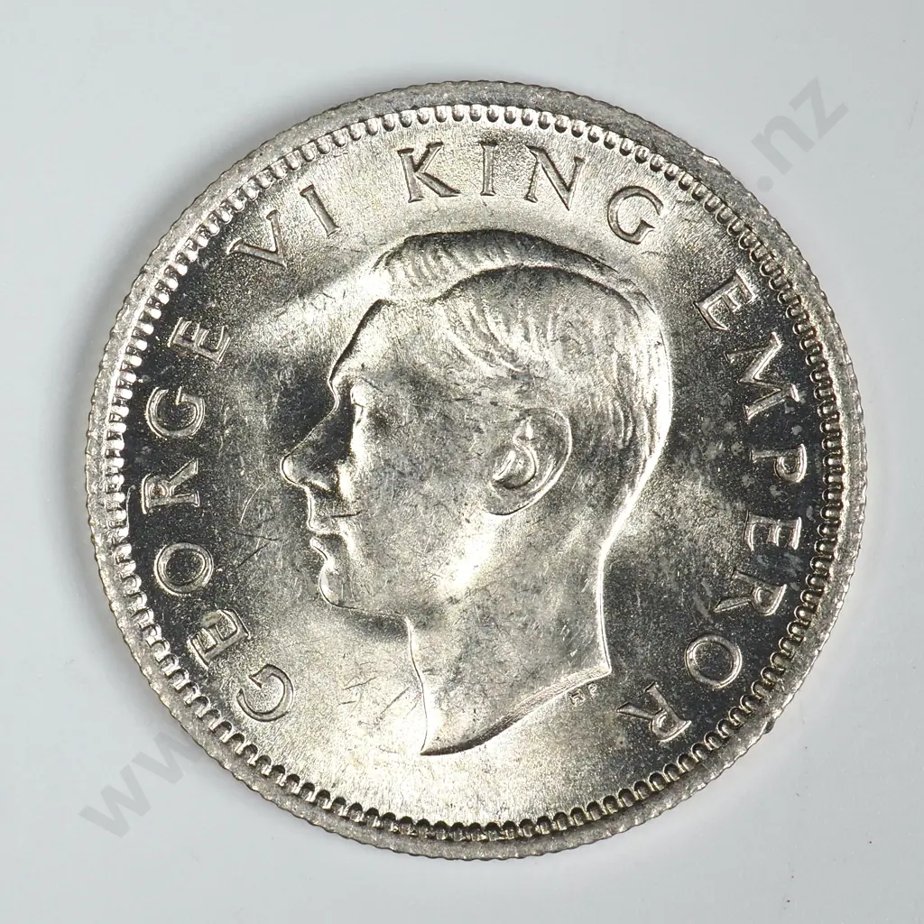 1946 SIXPENCE, B.UNC, C.V. $125 Image 1++