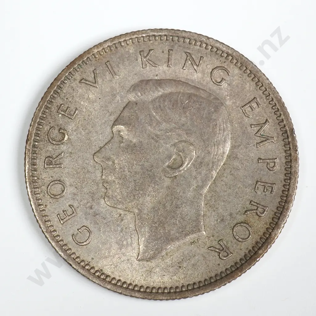 1940 ONE SHILLING, DIRTY OBVERSE, E.F, C.V. $80 Image 1++