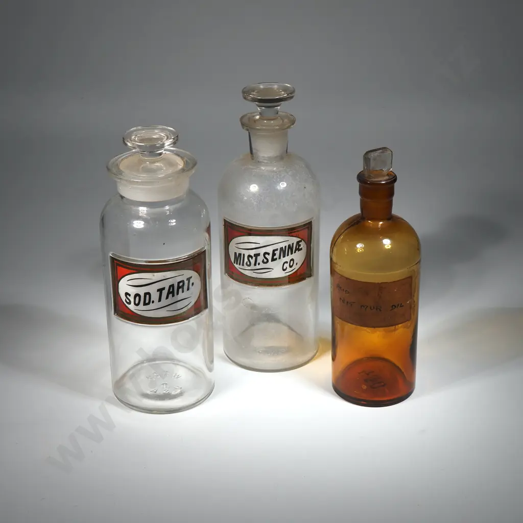 Three Glass  Antique Chemist Jars -"Sod. Tart", "Mis .Sennae Co." & "Sod.Tart" & An Amber Glass Chemist Jar Image 1++