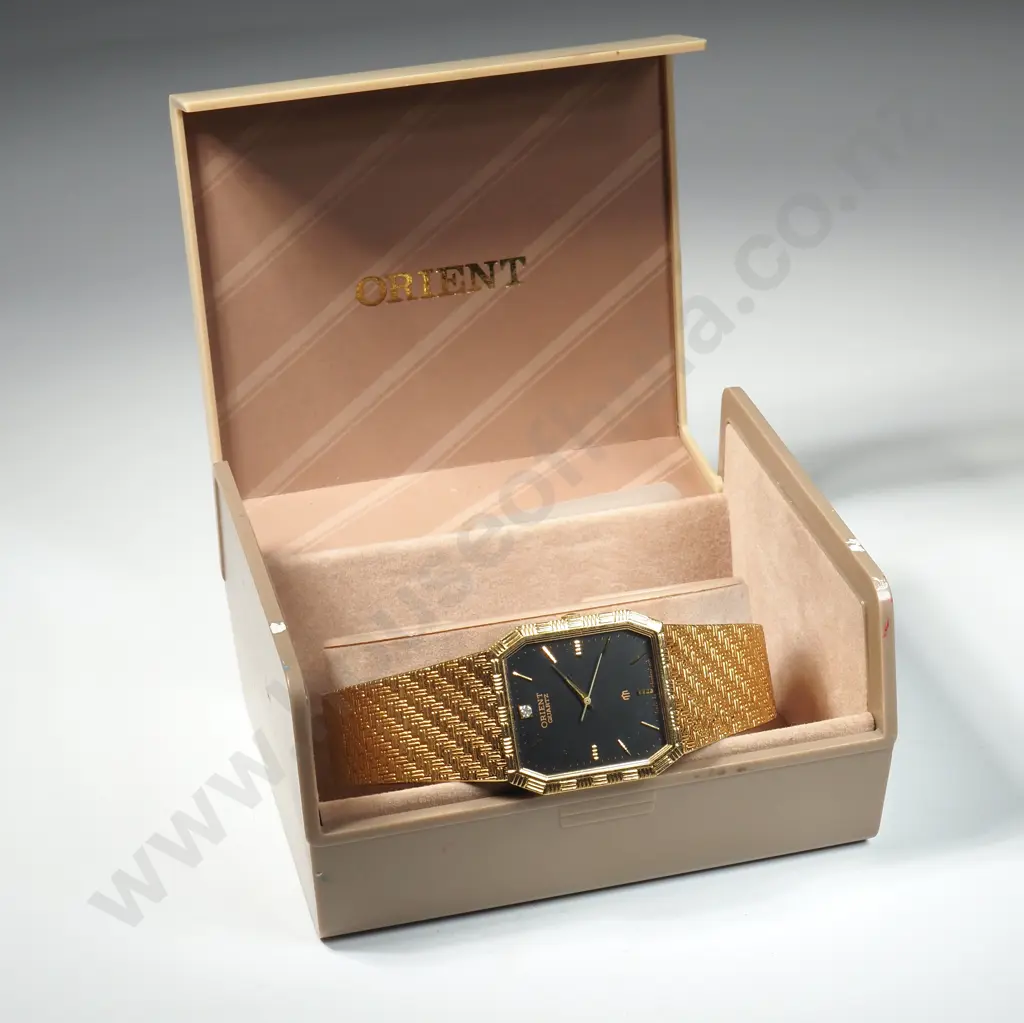 Gold-Plated Tank Style Orient Quartz Wristwatch Image 1++