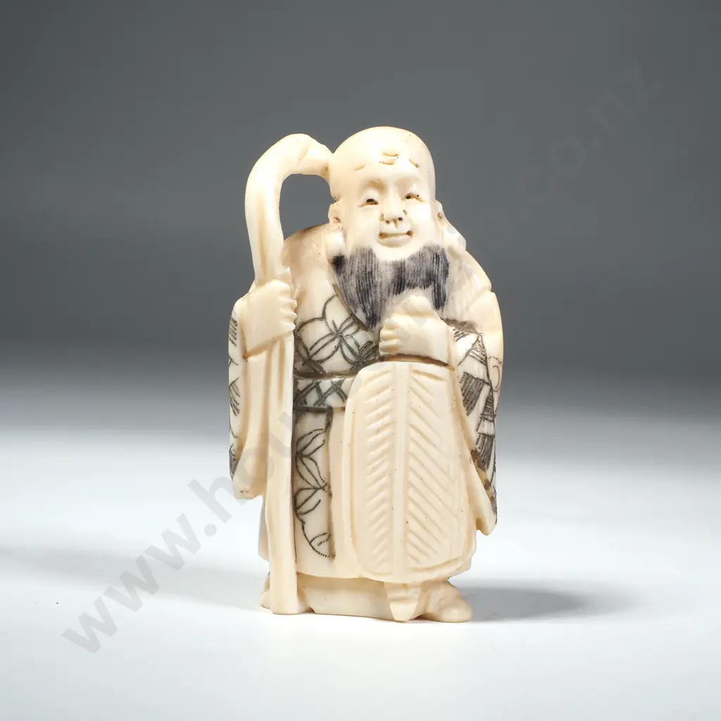 Japanese Carved Ivory Netsuke of a Man Holding a Fan & Staff Image 1++