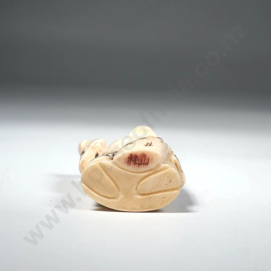Japanese Carved Ivory Netsuke of a Traveling Hotei Image 1++