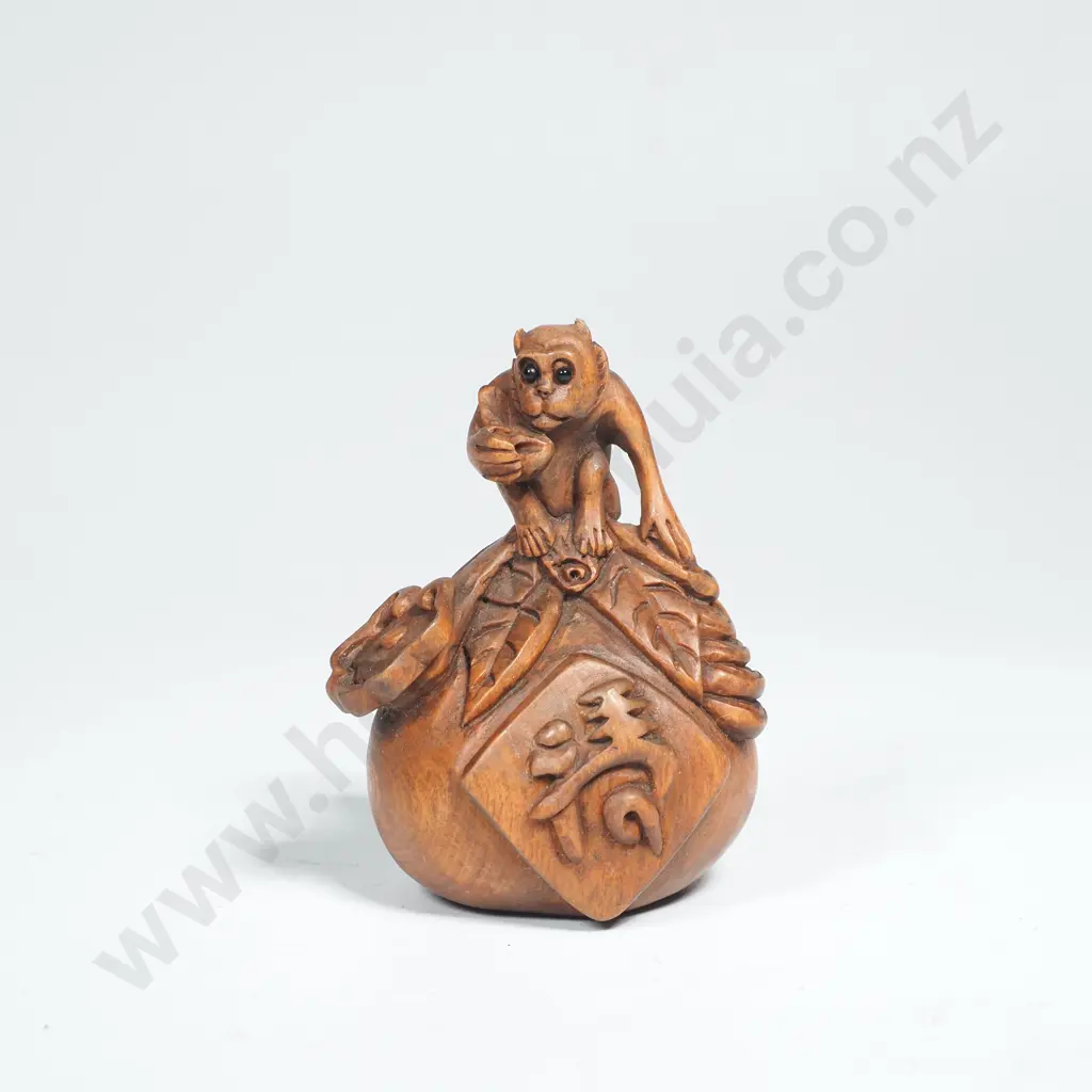 Carved Wooden Netsuke Featuring a Monkey on a Peach Image 1++