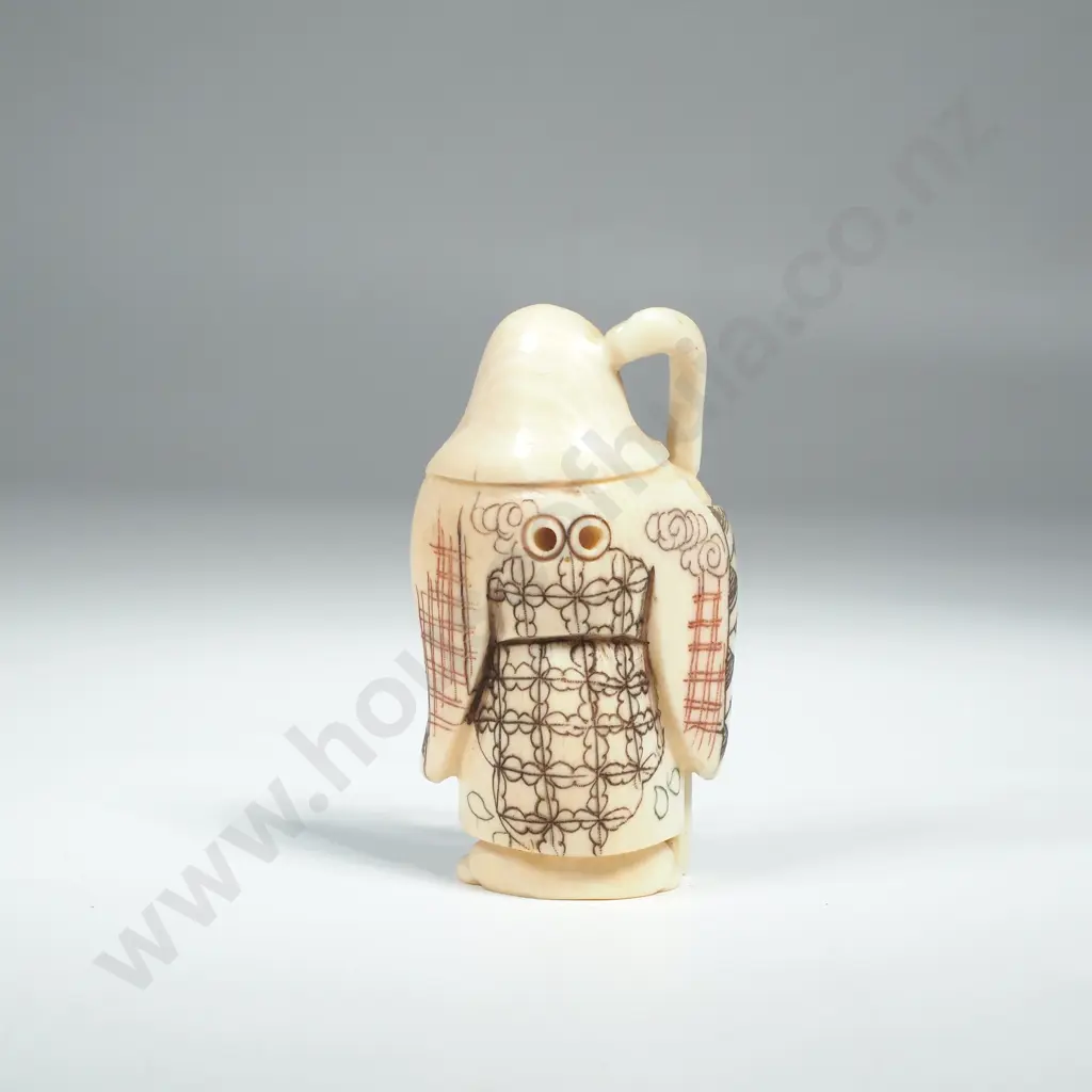 Japanese Carved Ivory Netsuke of a Man Holding A Scroll & Staff Image 1++