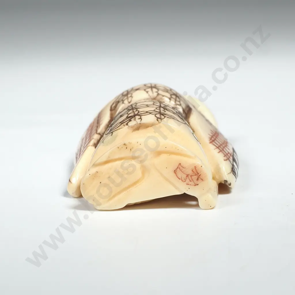 Japanese Carved Ivory Netsuke of a Man Holding A Scroll & Staff Image 1++