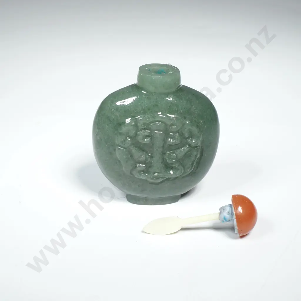 Chinese Nephrite Snuff Bottle w Carved Decoration to Front & an Amber Coloured Stopper Image 1++