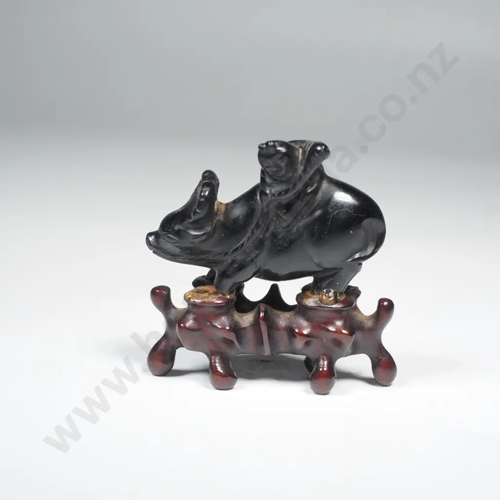 Antique Small Black Jade Carving of a Boy on a Buffalo On a Wooden Stand Image 1++