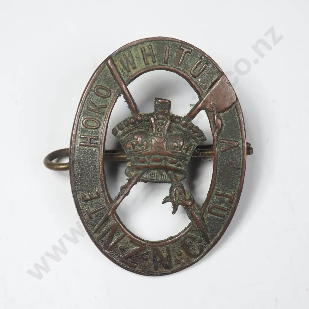 NZ Maori Battalion Cap Badge, Large NZNC At Base, Brass. Image 1++